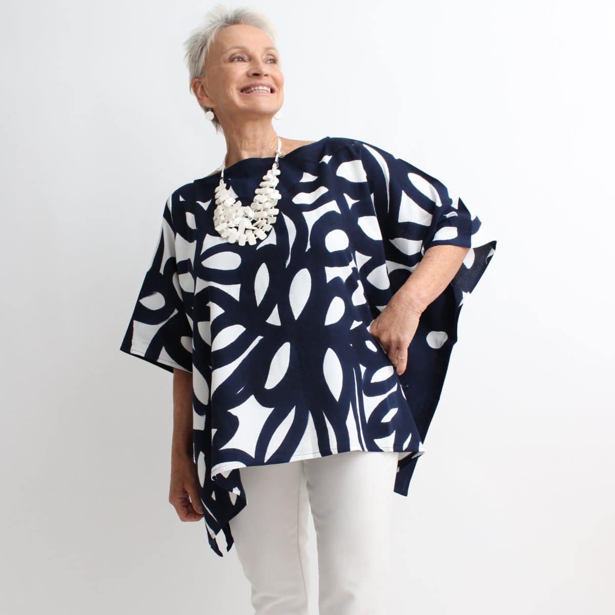 blue and white hand-painted top