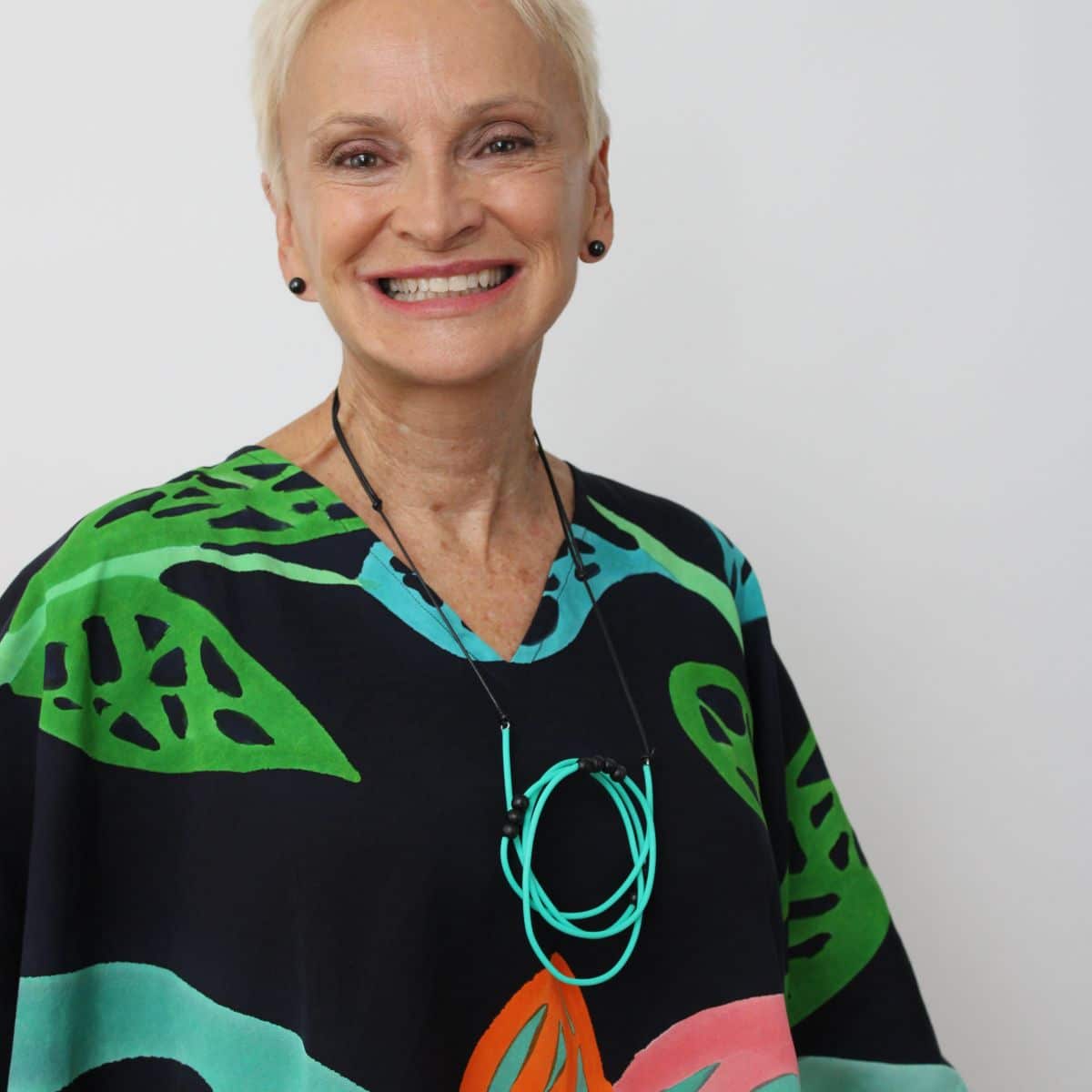 woman wearing aqua tubbing necklace