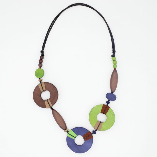 Colorful necklace with wooden beads on a white background