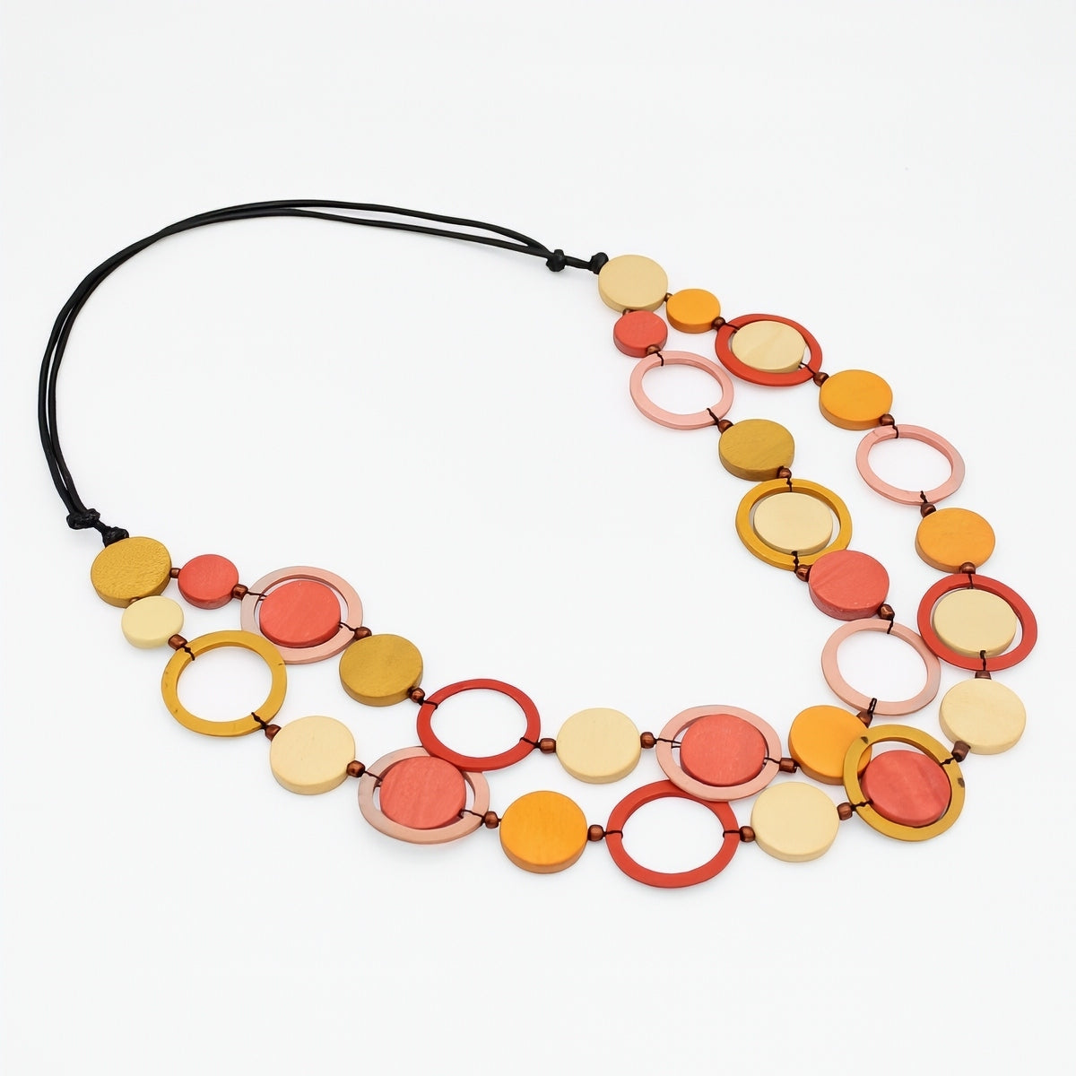 Colorful necklace with circular beads on a white background