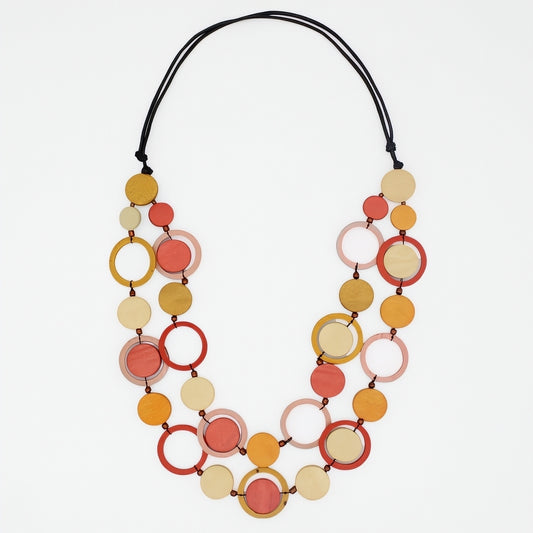 Necklace with colorful circular beads on a white background