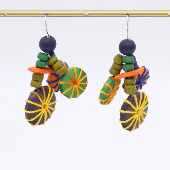 Colorful wood earrings on a white background