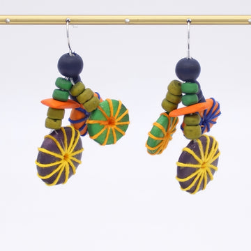Colorful wood earrings on a white background