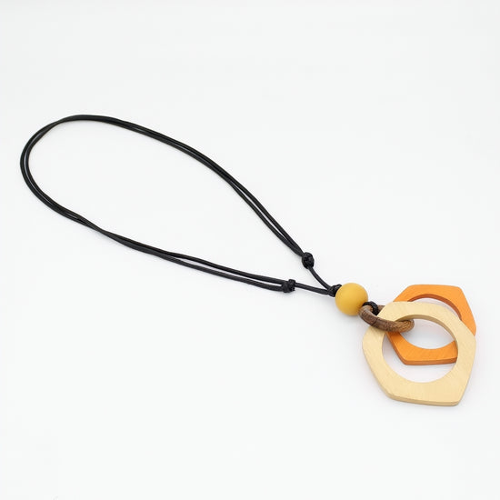 Necklace with interlocking heart-shaped pendants on a white background