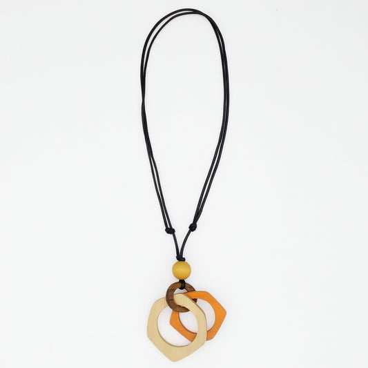 Necklace with wooden pendant on a white background