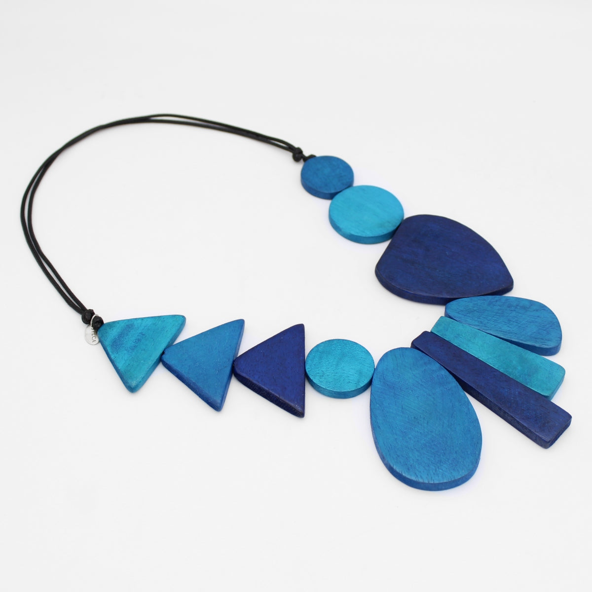 Blue geometric necklace on a white background