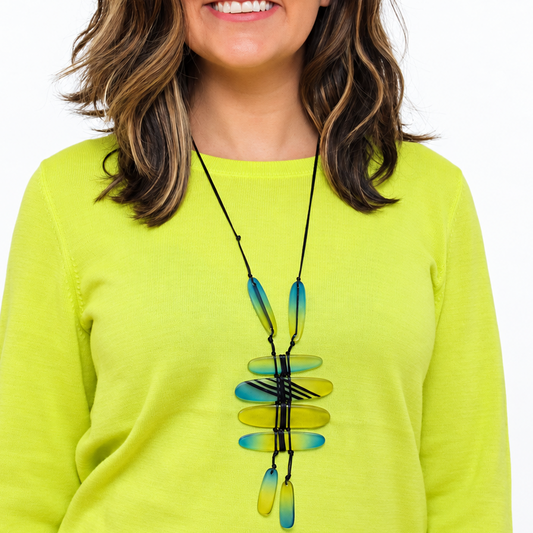 Model wearing a Green and blue funky statement pendant necklace