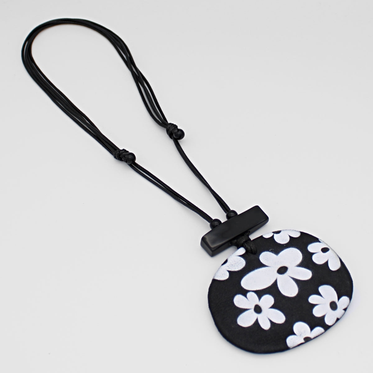 Paquerette Whimsical Leather Pendant