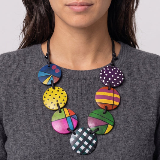 Woman wearing a large colorful statement necklace