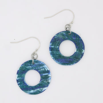 Pair of blue and green circular earrings on a white background