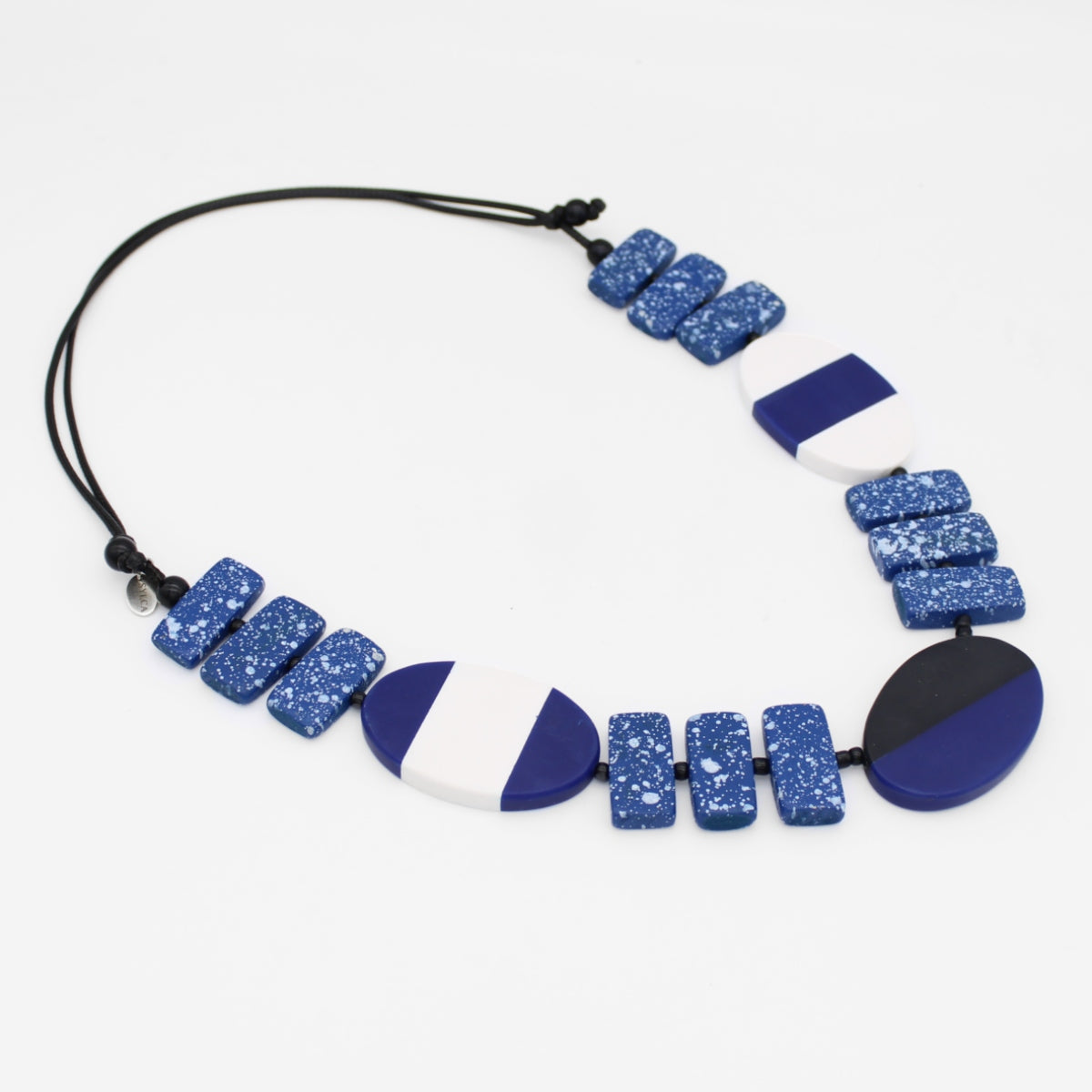 Necklace with blue and white speckled beads on a white background