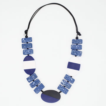 Necklace with blue and black geometric beads on a white background