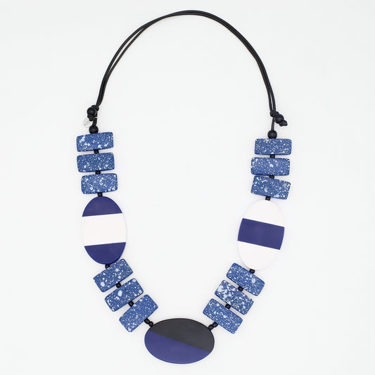Necklace with blue and black geometric beads on a white background