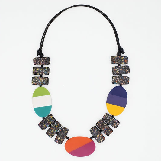 Necklace with multicolored beads on a white background