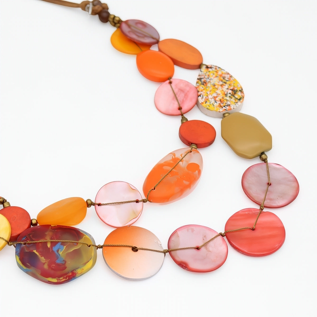 Colorful beaded necklace on a white background