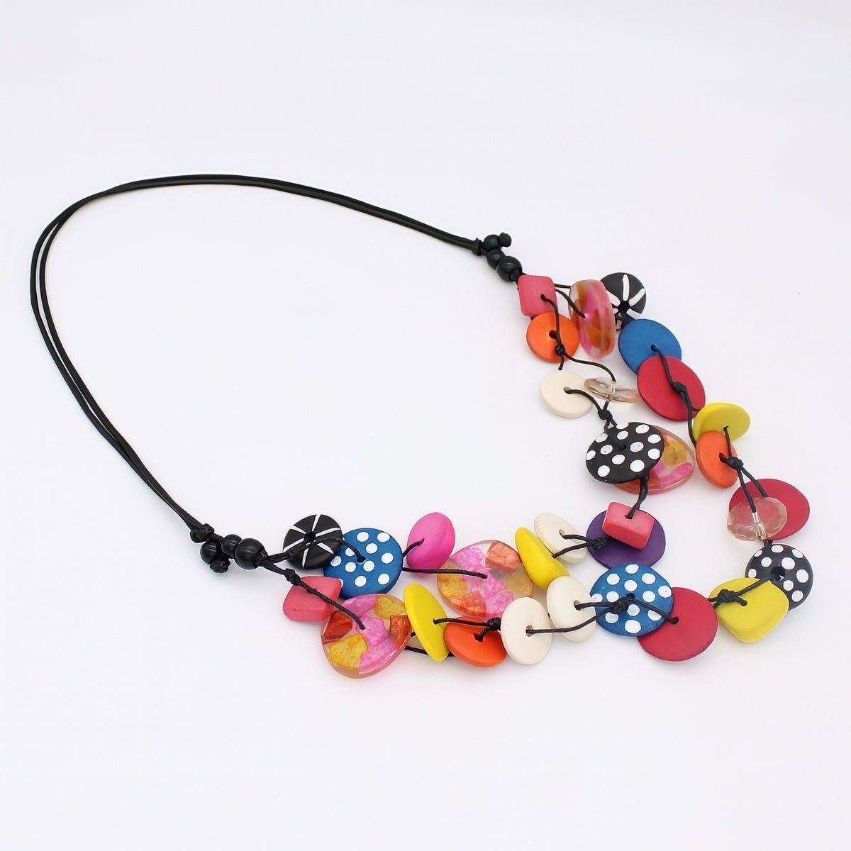 Colorful necklace with various shaped beads on a white background