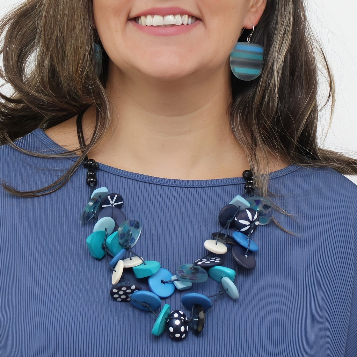 Blue Colorburst Confetti Layers Necklace, view 2: blue beads with patterned resin accents on an adjustable cord