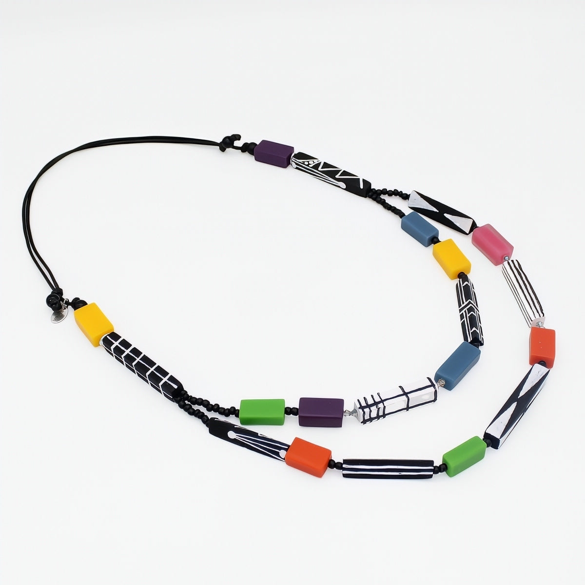 Necklace with colorful beads on a white background