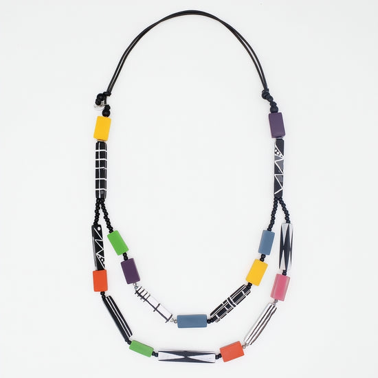Necklace with colorful beads on a white background