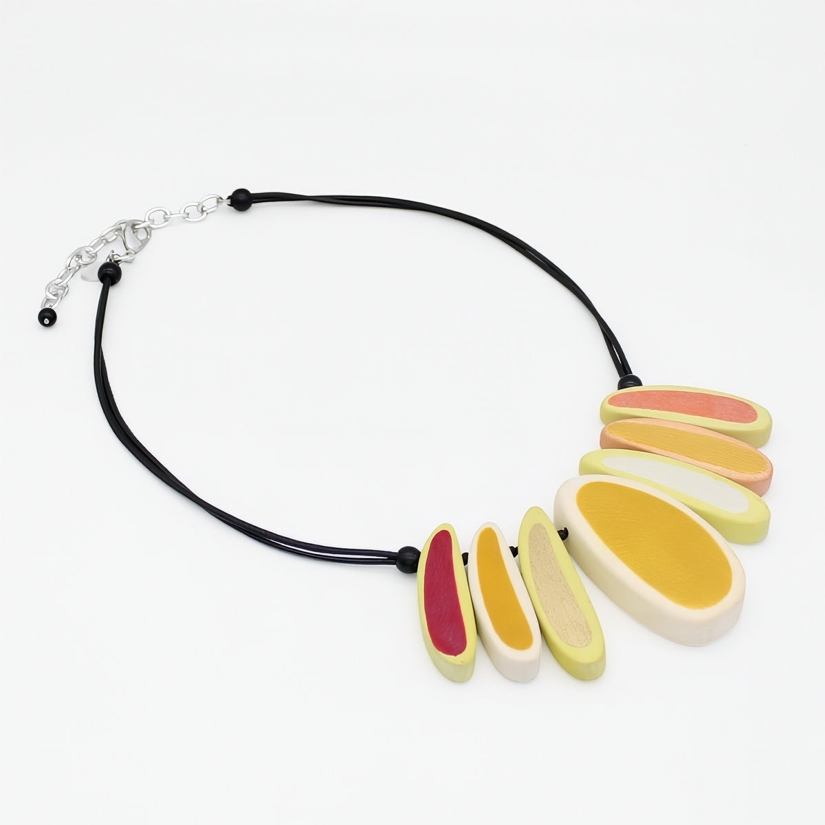 Necklace with colorful oval pendants on a white background