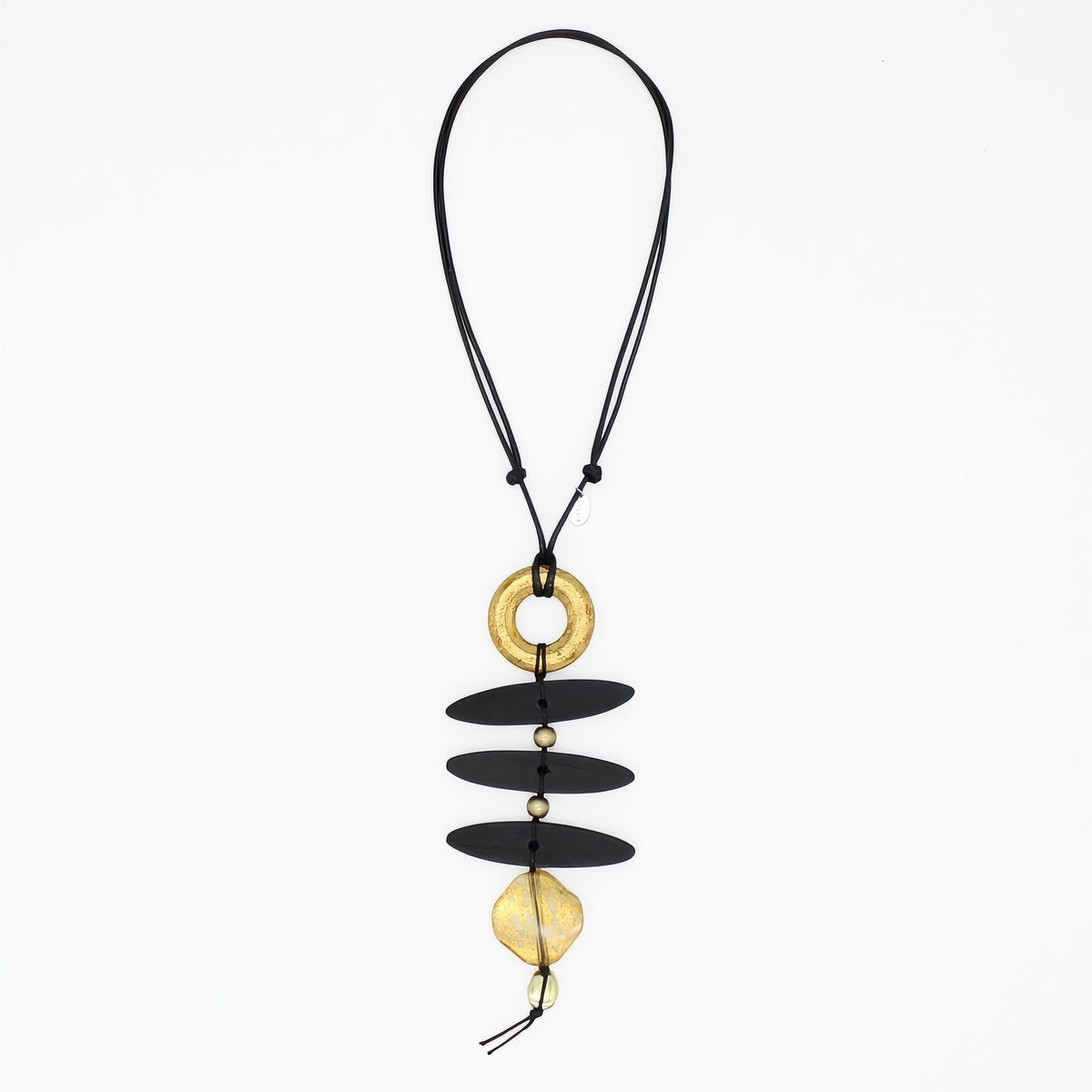 Black and gold sculptural statement necklace on adjustable black cord