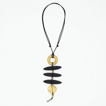 Black and gold sculptural statement necklace on adjustable black cord