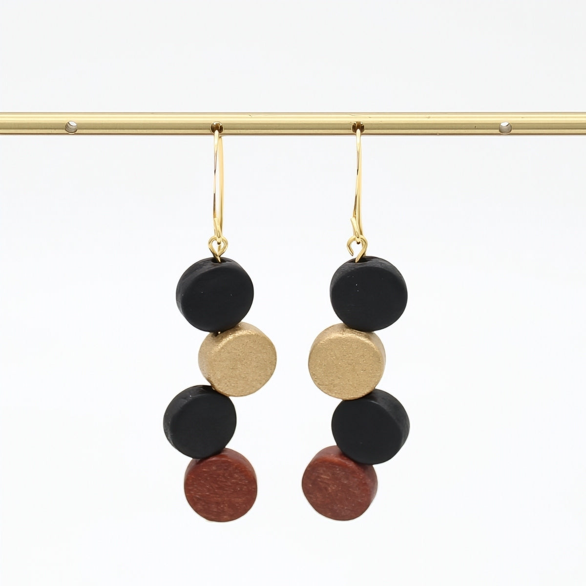 Bronze Eva Dangle Earrings by Sylca Designs on a white background