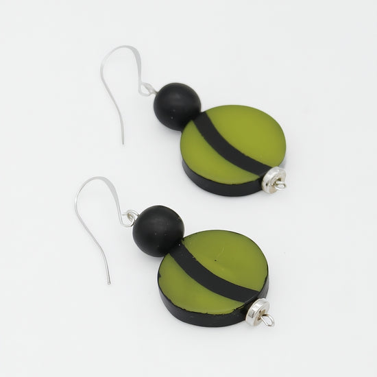 Green and black resin drop earrings angled product view