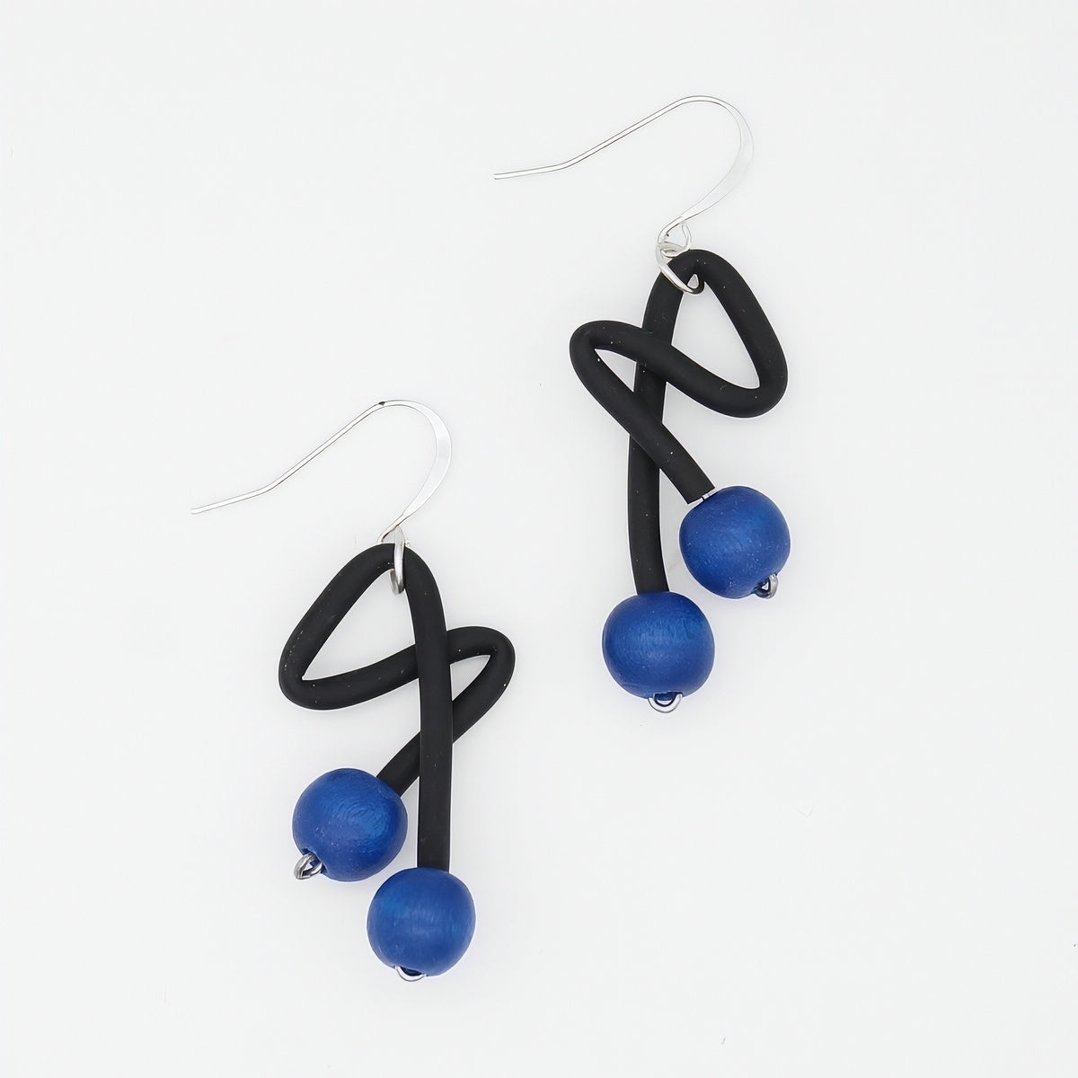 Blue and black sculptural statement earrings with silver plated French hooks