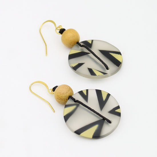 Yellow resin statement earrings angled product view