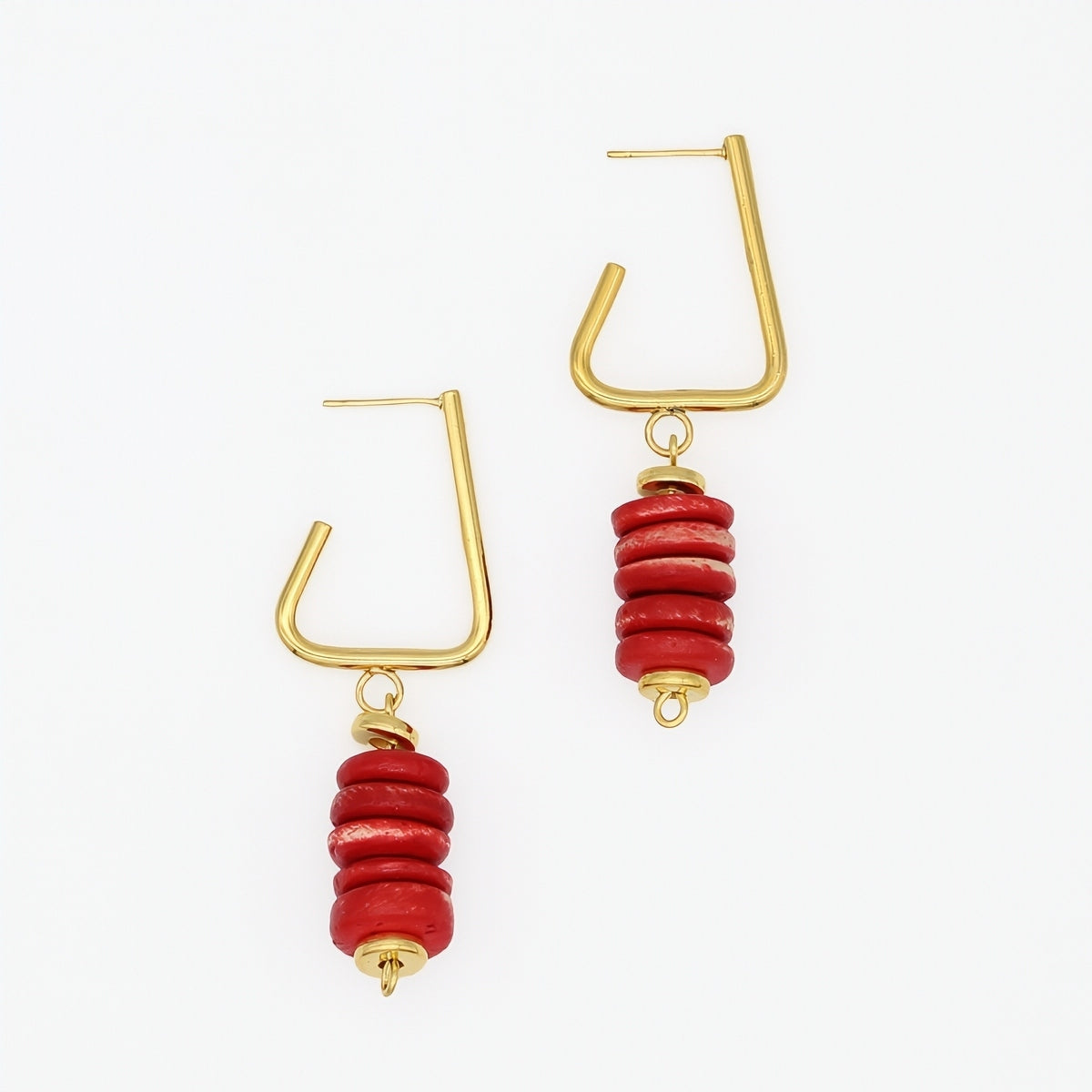 Red statement drop earrings with gold tone geometric hoops