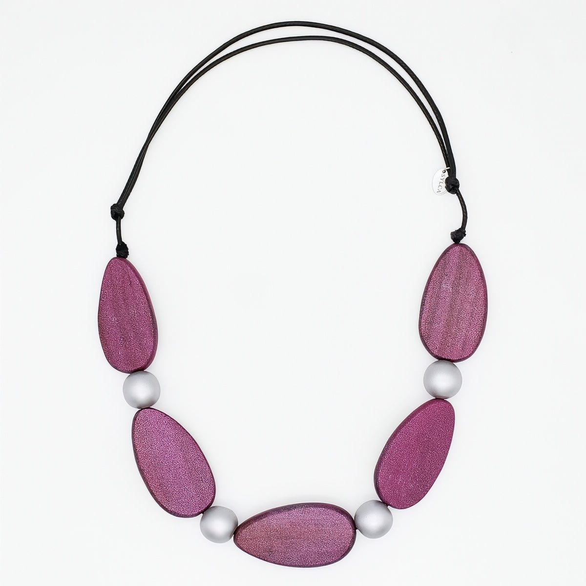 Necklace with pink wooden beads and white pearls on a white background