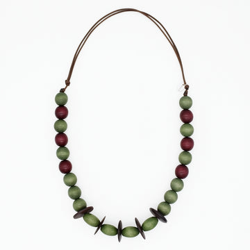 Olive green and burgundy wood statement necklace on white background