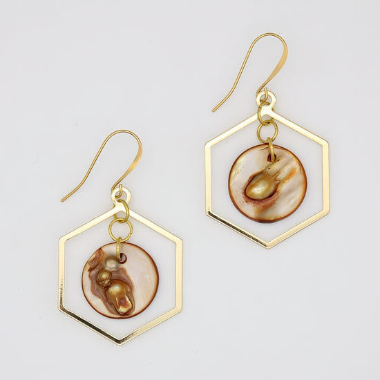 Gold hexagon statement earrings with round resin accents