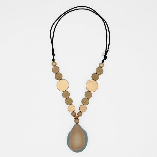 Taupe and gold wood statement necklace with layered resin pendant on white background