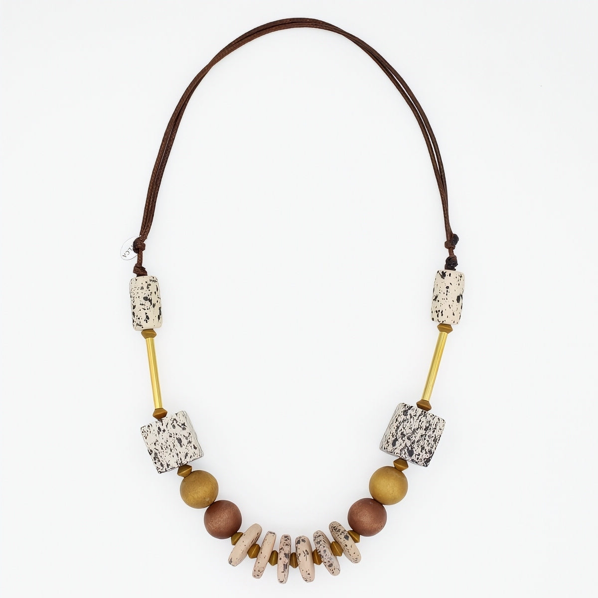 Natural wood statement necklace with speckled cream beads and gold accents on white background