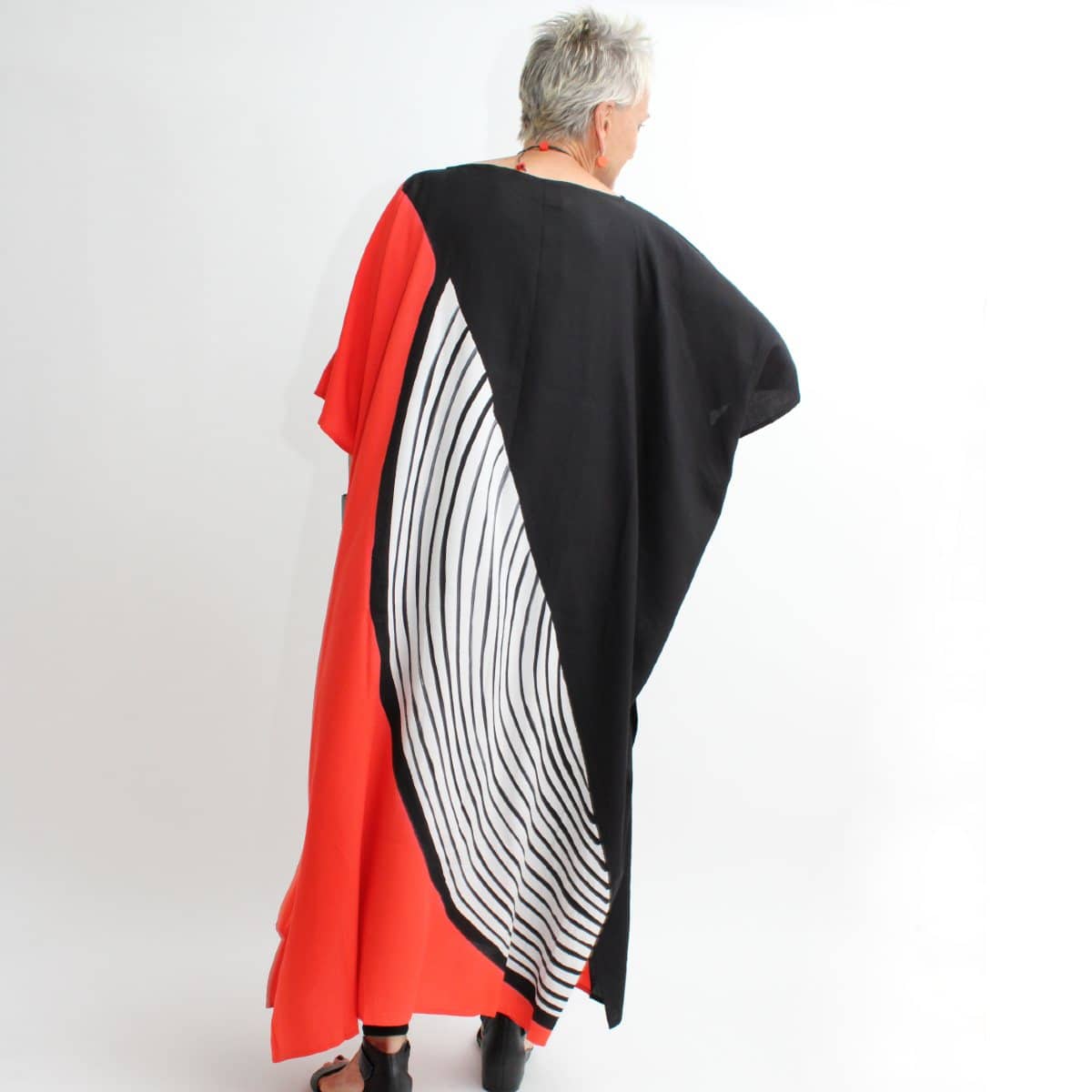 back of red, black, white half circle maxi dress caftan